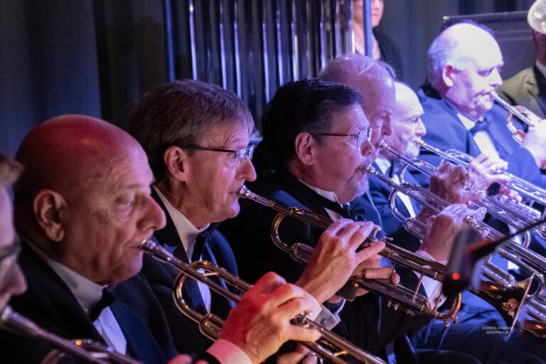 View of the trumpet section performing